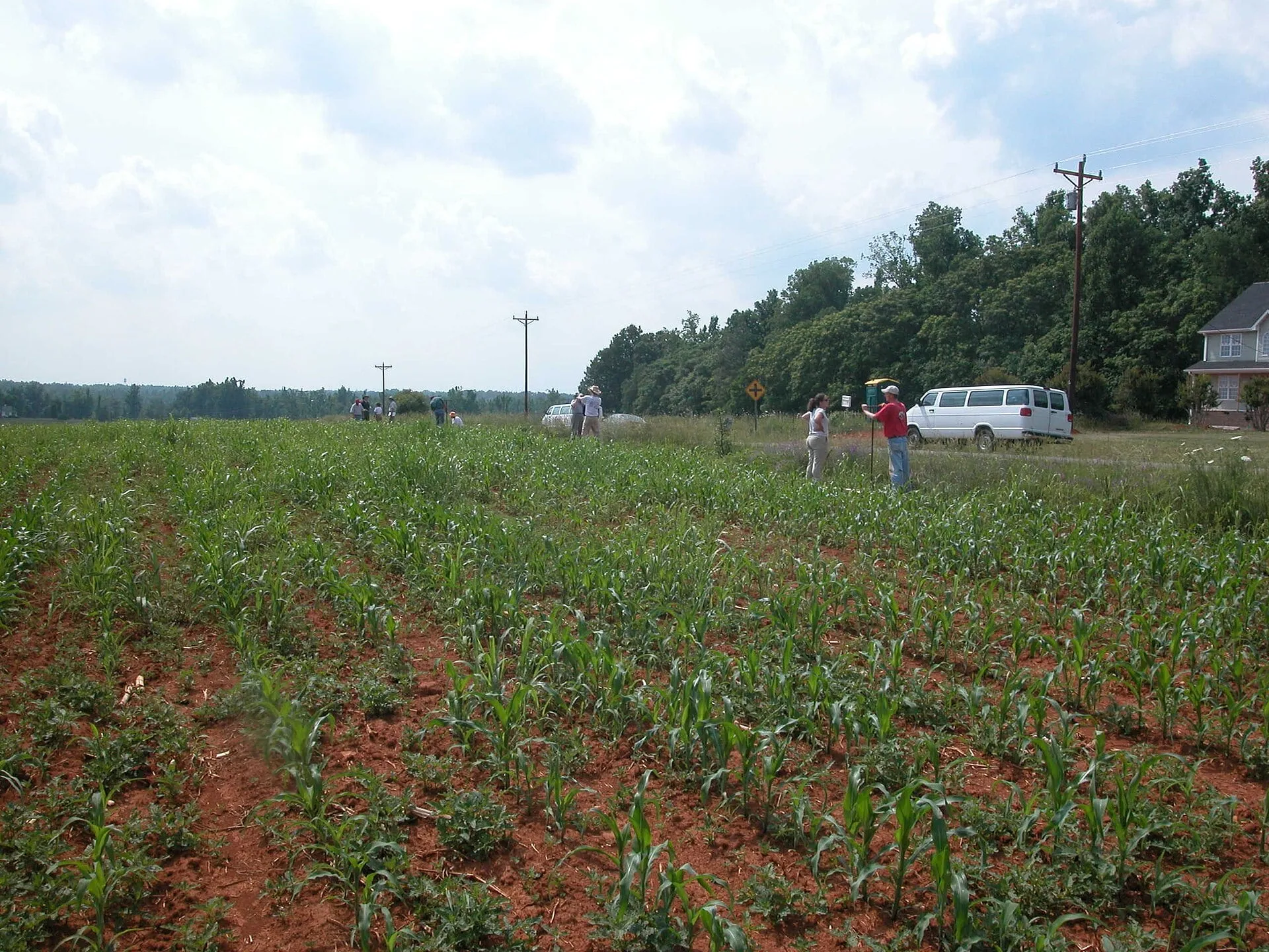 A red clay farm field